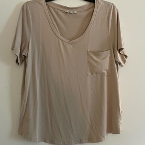 Love Tree brand size medium in the color tan